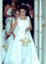 Sarah Leads the Other Flower Girls Down the Isle